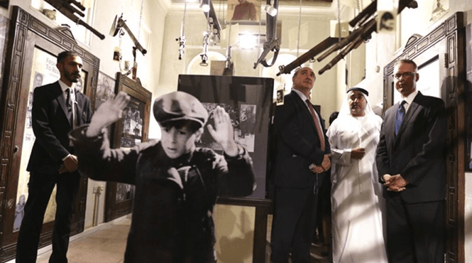 Officials viewing Holocaust exhibit displays in Dubai museum